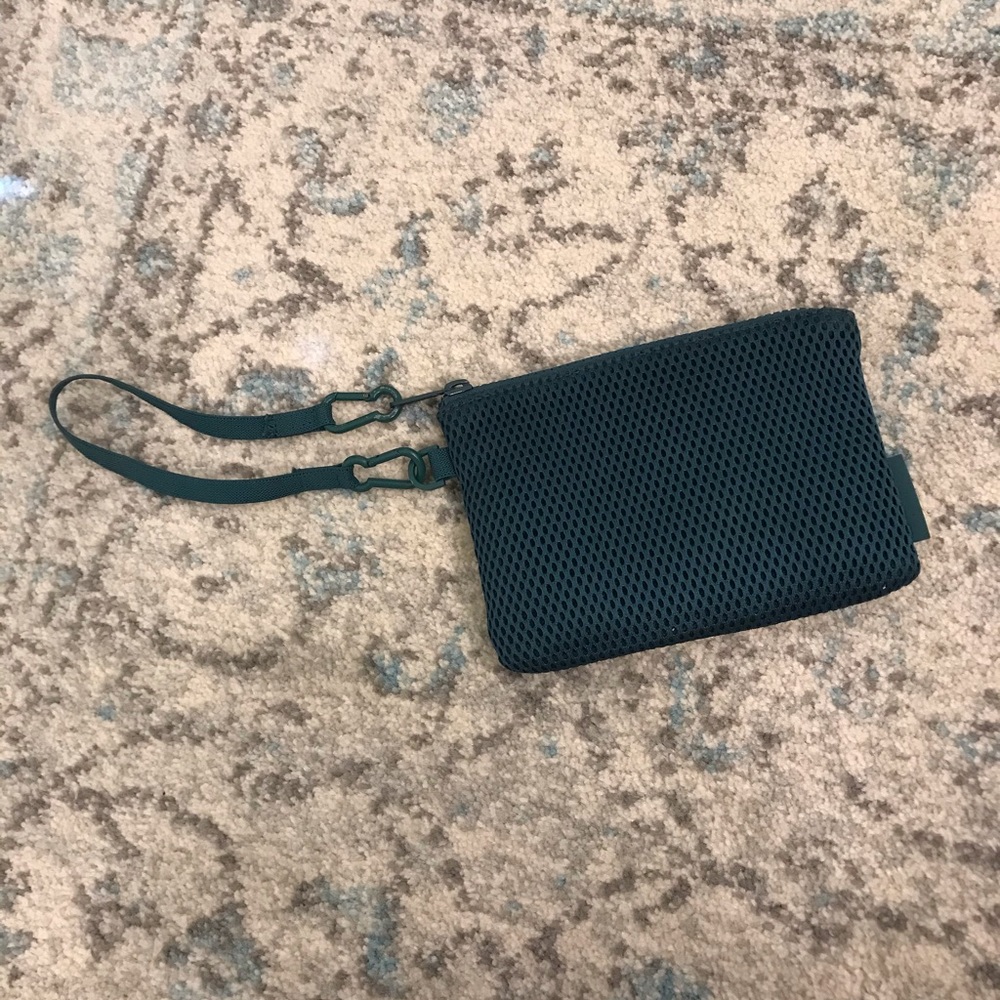 Dagne dover emerald green mesh wristlet